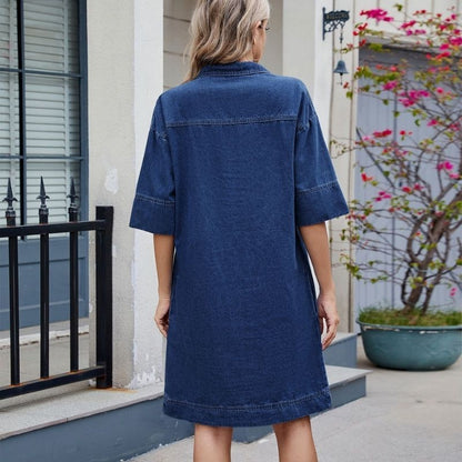 Women’s v neck short sleeve relaxed denim midi dress with pockets in navy, back view