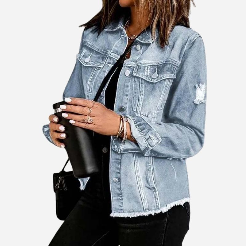 Women's ripped denim jacket distressed jean coat in light blue, side view