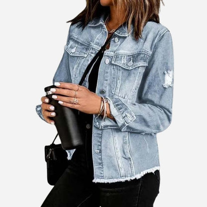 Women's ripped denim jacket distressed jean coat in light blue, side view